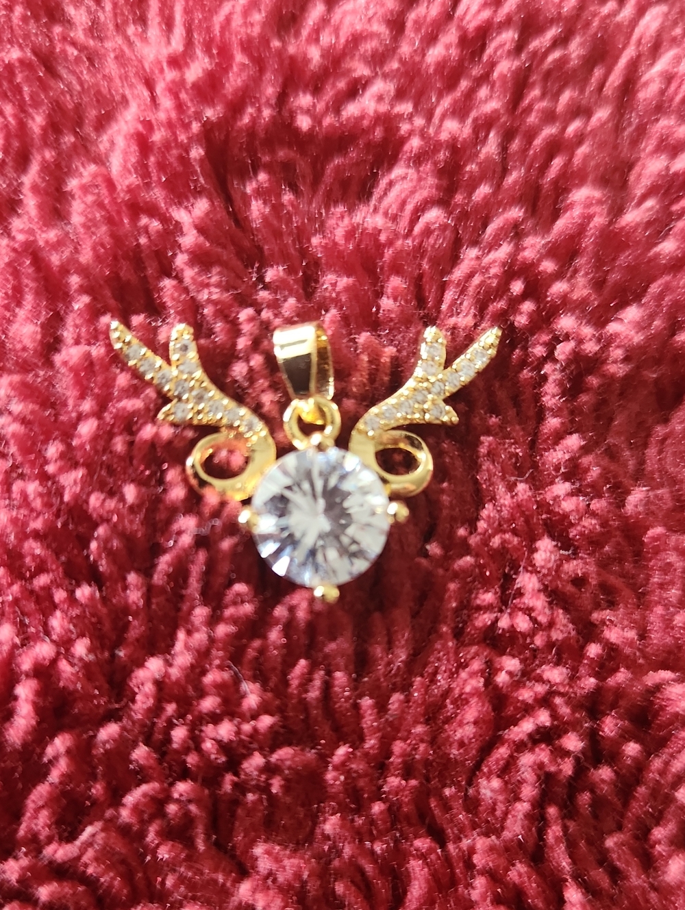 Gold Tone Antler Pendant with Clear Crystal Accent